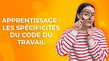 étudiante observant les spécificité du code du travail pour l'apprentissage à la loupe