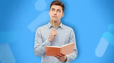 étudiant notant toutes les infos sur la fiscalité et droits des apprentis