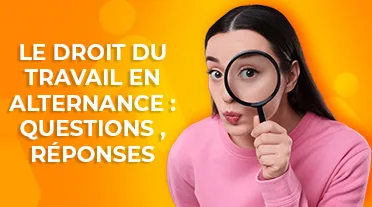 étudiante observant à la loupe les droit du travail en alternance