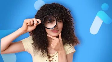 étudiante observant à la loupe la différence de salaire entre apprentissage et contrat de professionnalisation